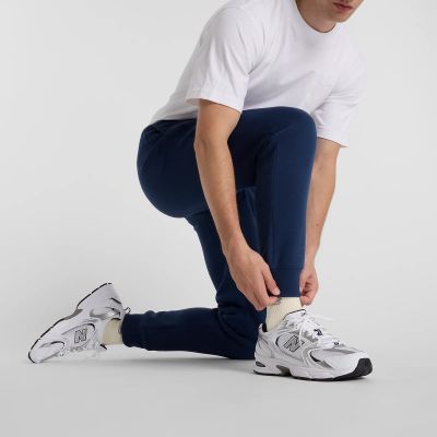 6. Spodnie New Balance Sport Graphic Fleece Jogger M MP51940NNY