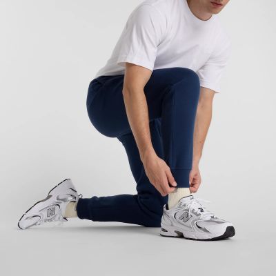 11. Spodnie New Balance Sport Graphic Fleece Jogger M MP51940NNY