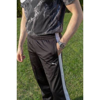 5. Spodnie Puma Contrast M 831288 01