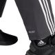 5. Spodnie adidas Future Icons Three Stripes Woven W IP1567