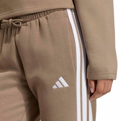 4. Spodnie damskie adidas Essentials 3-Stripes Fleece Slim beżowe KF8317