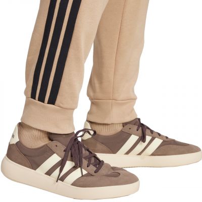 6. Spodnie adidas Essentials 3-Stripes Fleece M JX0712