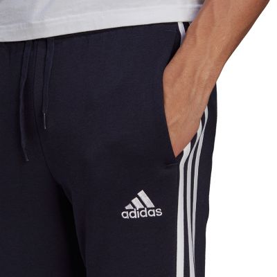 5. Spodnie adidas Essentials Fleece Tapered Cuff 3-Band M GK8823