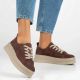 8. Skórzane sneakersy damskie na platformie brązowe Filippo DP7982