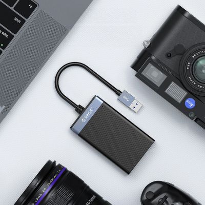 11. Czytnik kart pamięci Orico CL4D-A3 USB-A 3.0 SD microSD CF MS 5 Gb/s - czarno-srebrny