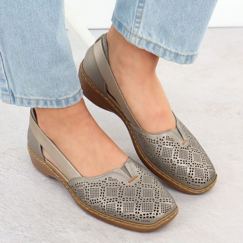 7. Skórzane półbuty damskie ażurowe komfort bezowe Rieker 41351-90