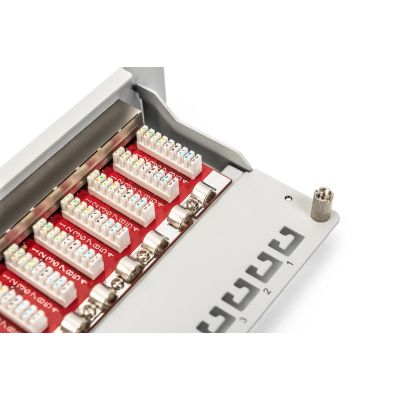 7. Digitus Panel krosowy (patch panel) 10'' 12x RJ45, LSA poziom, kat.6A, ekranowany, 1U, szary, prowadnica kabli