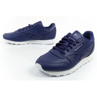 8. Reebok buty sportowe damskie sneakersy Classic fioletowe skóra modne