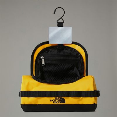 2. Kosmetyczka base camp travel canister summit gold-black The North Face