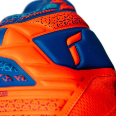 13. Rękawice bramkarskie Reusch Attrakt Starter Solid Jr 5572514 2290