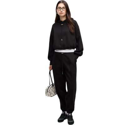 5. Spodnie damskie Puma Her Comfort Pants Fl czarne 694032 01