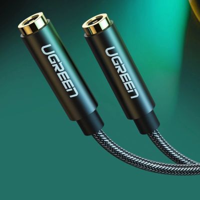2. Kabel słuchawkowy Ugreen AV123 minijack 3.5 mm (męski) - 2x minijack 3.5mm (żeński) - czarny