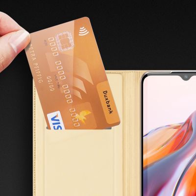 15. Dux Ducis Skin Pro etui do Xiaomi Redmi 11A / Poco C55 / Redmi 12C pokrowiec z klapką portfel na kartę podstawka złote