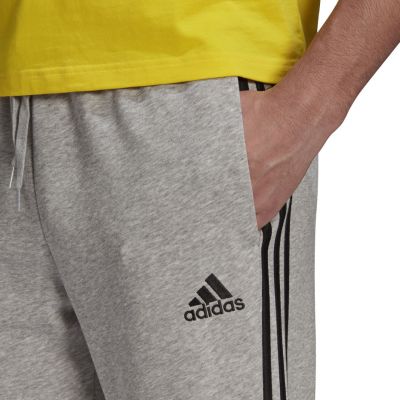 4. Spodnie adidas Essentials Tapered Cuff 3 Stripes M GK8889