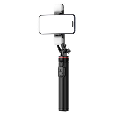 9. Selfie stick WC12YDS teleskopowy tripod 1.3m ze stopu aluminium z podwójną lampą i uchwytem na telefon - czarny