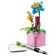 11. LEGO Creator 3w1 31169 - Maszyna do pisania z kwiatami