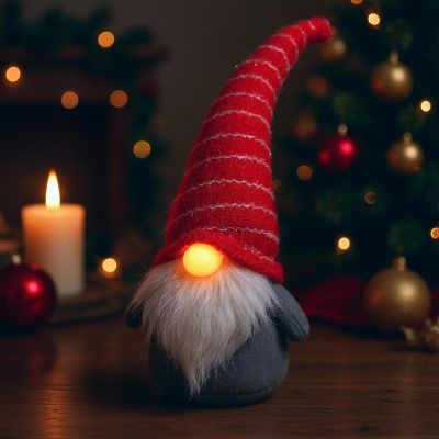 10. SKRZAT Z DŁUGĄ CZERWONĄ CZAPKĄ I ŚWIECĄCYM NOSEM 10x9x42CM