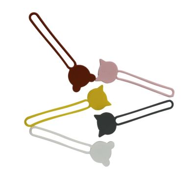 4. Silikonowy zwijacz kabla - biały