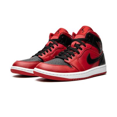 3. Buty Air Jordan 1 Mid GS - 554725-660