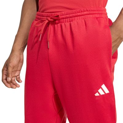 5. Spodnie męskie adidas Essentials Feelcozy czerwone KC0915