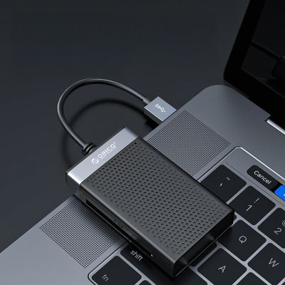 7. Czytnik kart pamięci Orico CL4D-A3 USB-A 3.0 SD microSD CF MS 5 Gb/s - czarno-srebrny