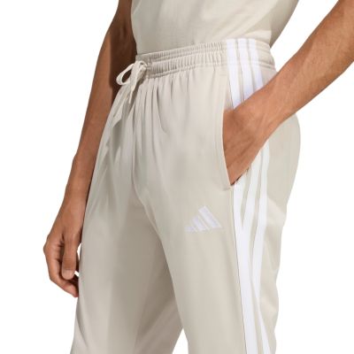 4. Spodnie męskie adidas 3-Stripes Tricot Regular Tapered beżowe JY7721