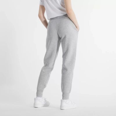 8. Spodnie New Balance Sport Fleece Jogger W WP43805AG
