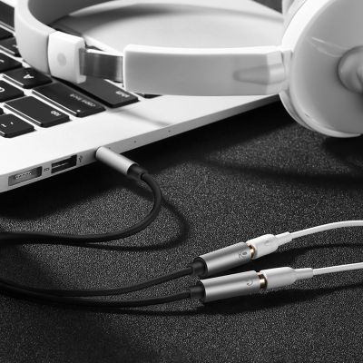 3. Ugreen kabel przewód rozdzielacz słuchawkowy mini jack 3,5 mm - 2 x mini jack 3,5mm (mikrofon + wyjście stereo) czarny (AV141)