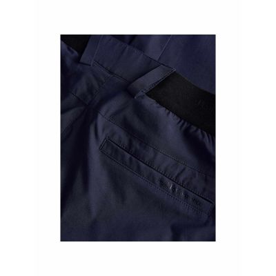 5. Spodnie męskie Peak Performance M Player Pants kolor granatowy