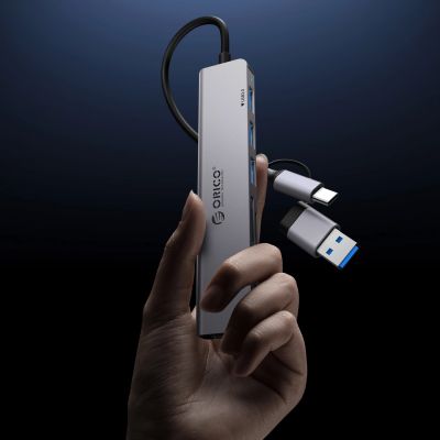 7. Hub USB-A/USB-C Orico YSB4-U2 stacja dokująca 2x USB-A 2.0 + 1x USB-A 3.0 + 1x USB-C 2.0 + 1x USB-C - szary