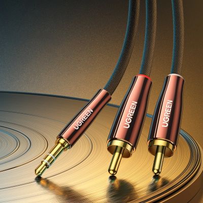 2. Ugreen kabel przewód audio 3,5 mm mini jack (męski) - 2RCA (męski) 2m miedziany (AV170)