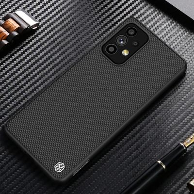 13. Nillkin Textured Case wytrzymałe wzmocnione etui z żelową ramką i nylonem na tyle Samsung Galaxy A73 czarny
